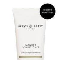 Close up shot of Percy & Reed Wonder Conditioner for smooth hair