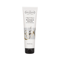 White tube labeled "Percy & Reed Wonder Balm Hair Primer," with black cap; 150ml size.